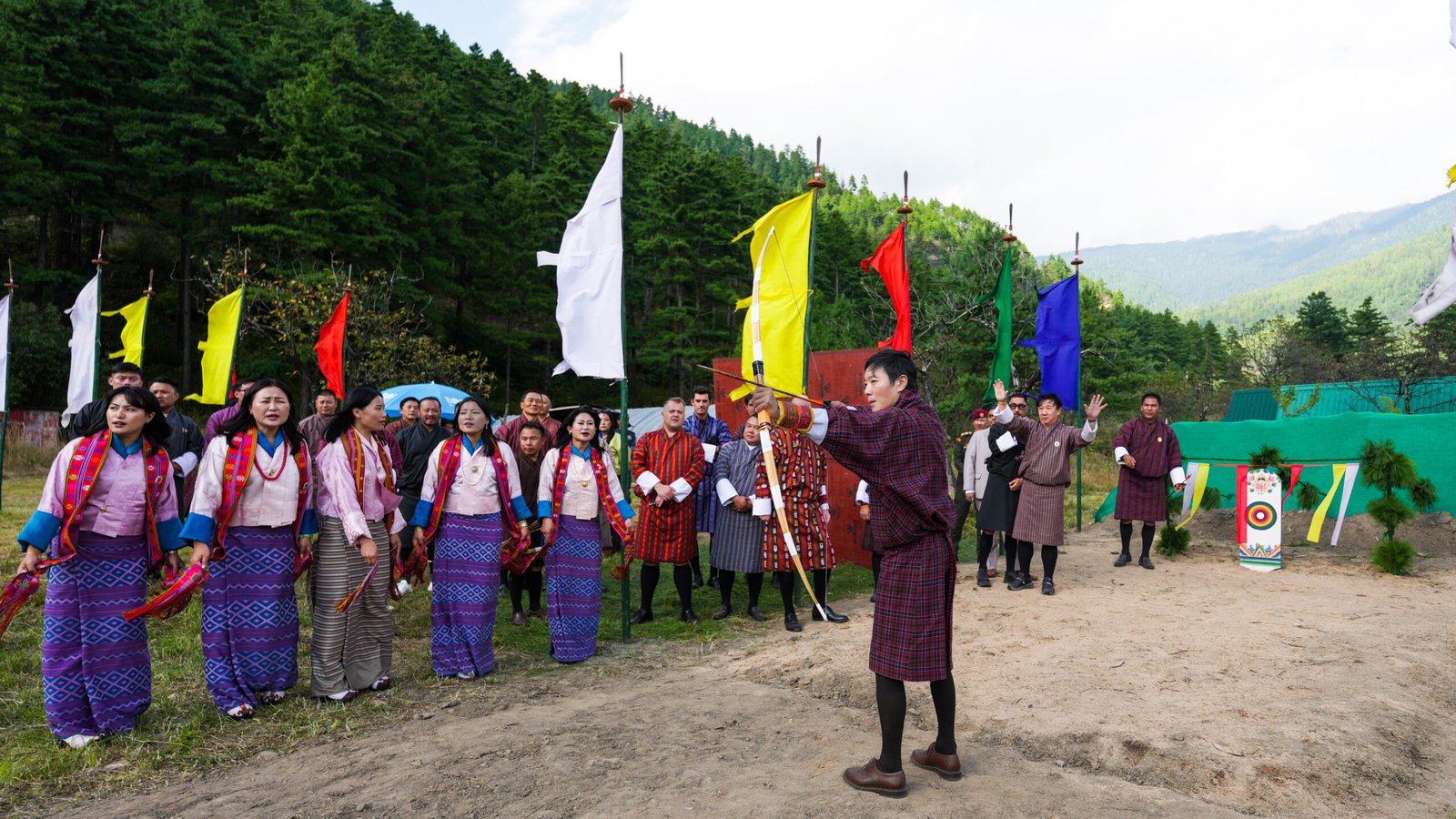 HRH playing traditional archery